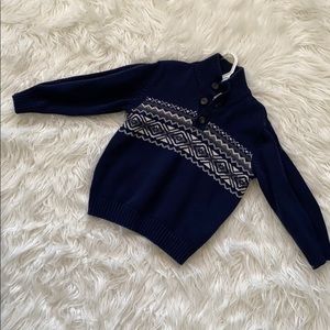 Lightly worn boy sweater.